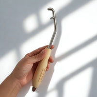 Herramienta para eliminación de lías en cava y champagne.